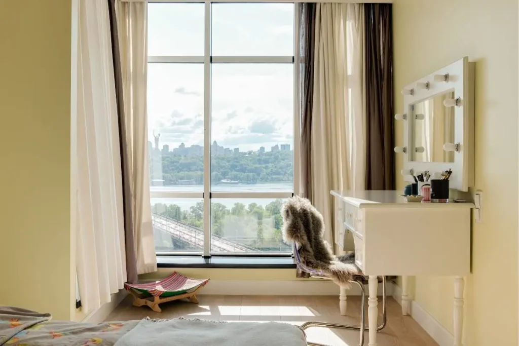mirror placement to make a small studio apartment look bigger