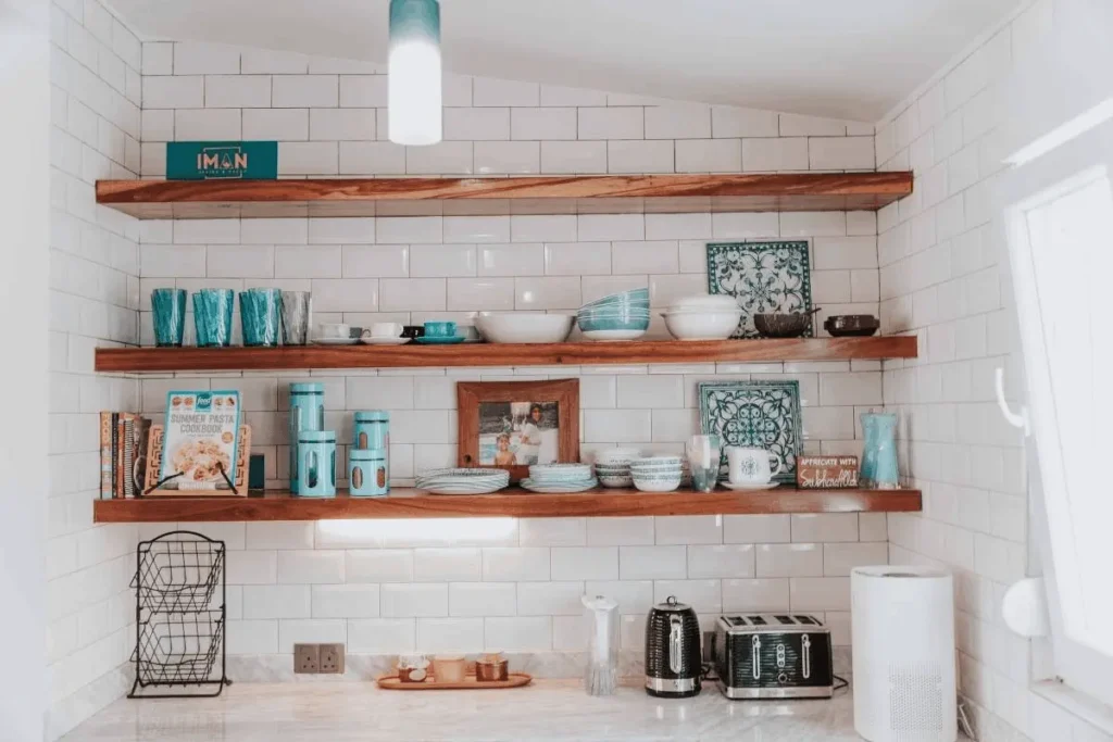 Very Small Kitchen Storage Ideas That Do Not Need a Drill 1 wall-mounted no-drill pegboard storage rack in a very small kitchen