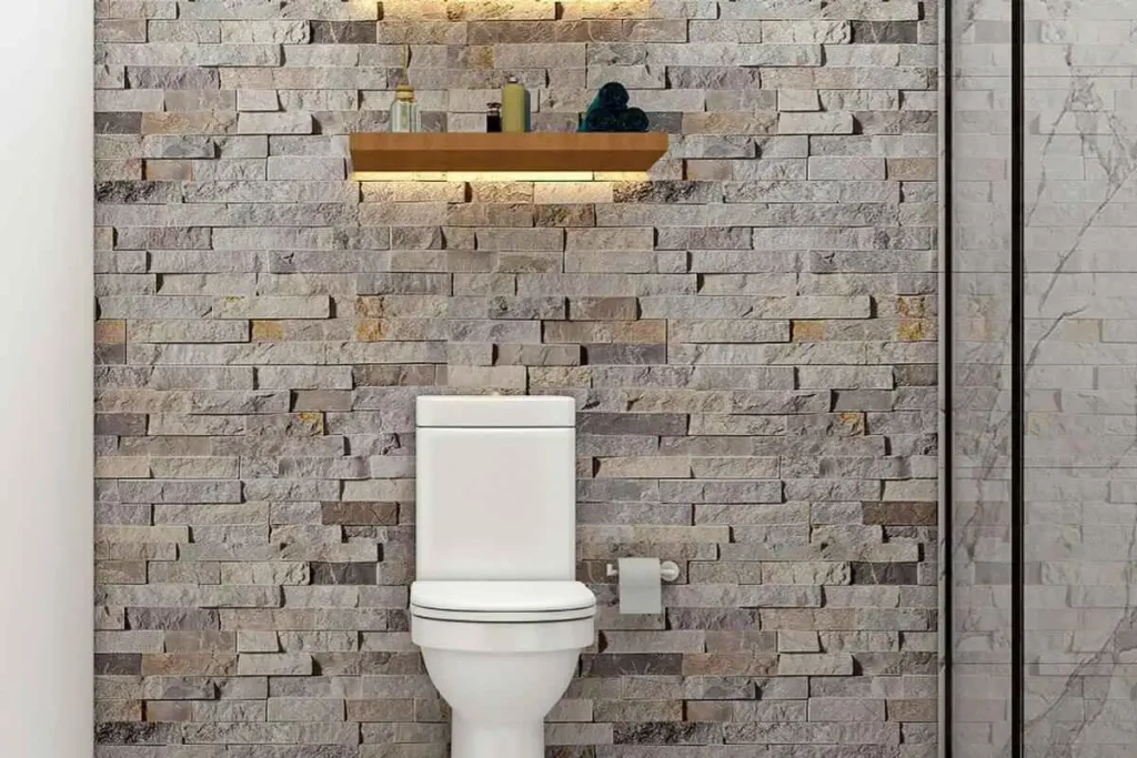 freestanding storage above toilet in small bathroom with no cabinets