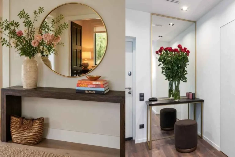 Ideas on how to style a console table in an entryway with a round mirror, tall flower vase, and stacked books.