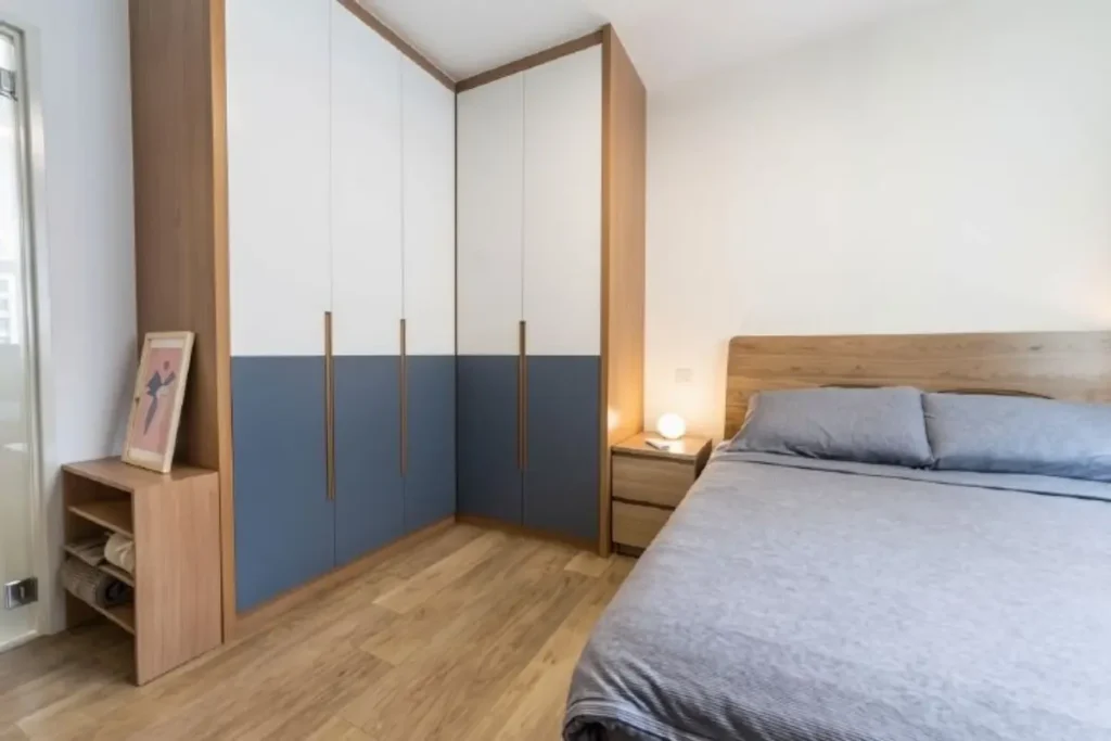 15 best two-colour combinations for a wardrobe in a small bedroom 2 two colour combination for wardrobe in small bedroom featuring blue and white laminate finish.