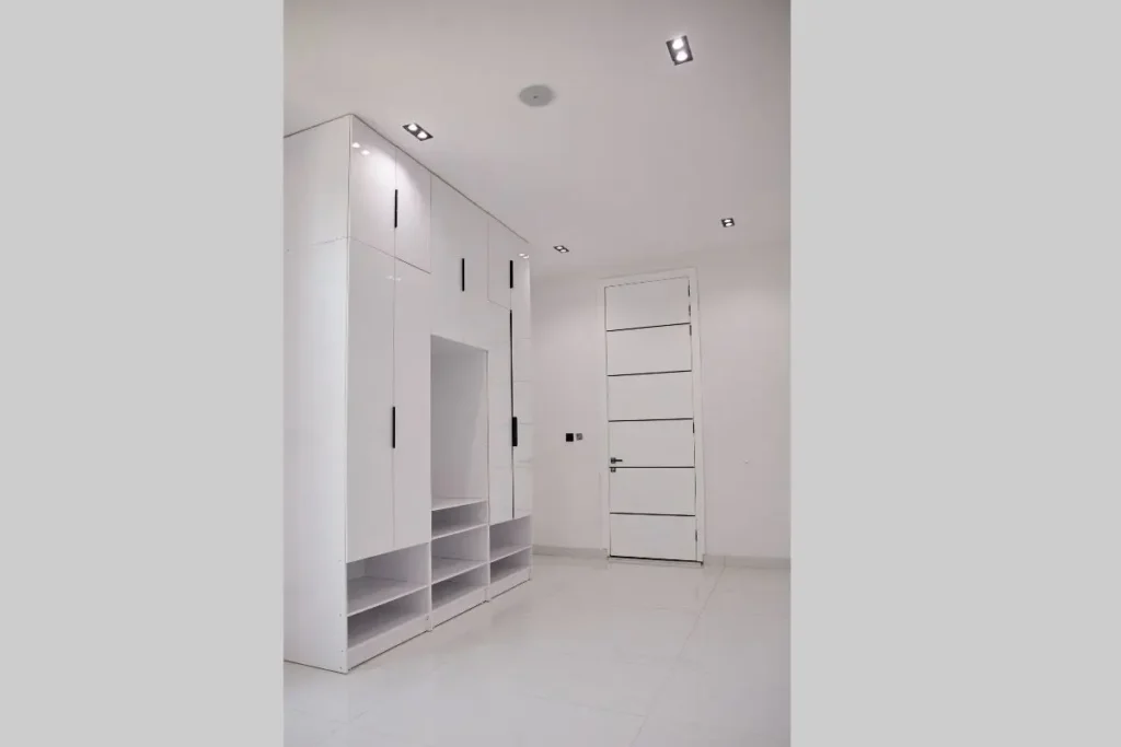 7 common wardrobe design mistakes in small bedrooms 2 floor to ceiling built in wardrobe with loft cabinets in small bedroom.