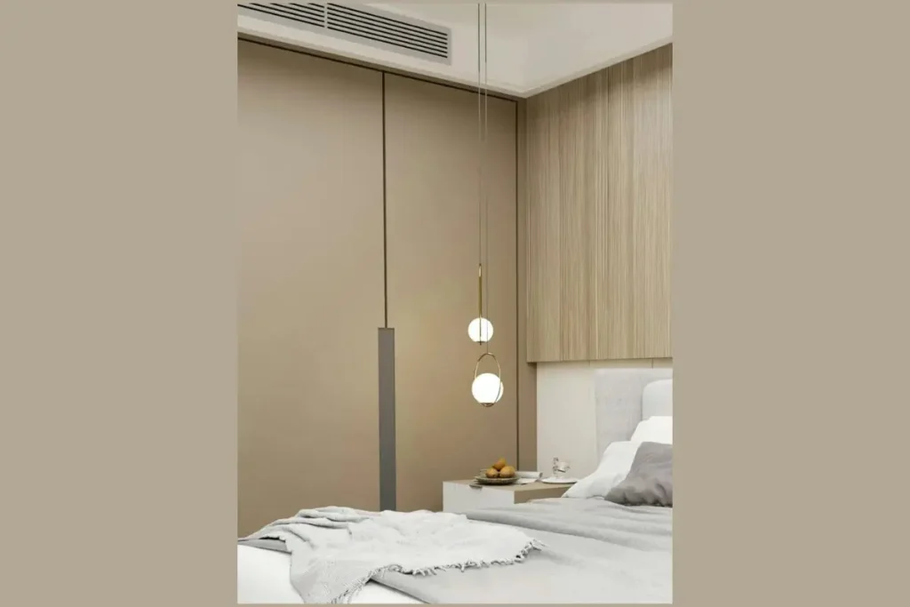 Should Wardrobe Match Bedroom Furniture? 7 Small Room Rules 2 how to match bedroom furniture wood tones using warm neutral wardrobe panels and accent lights.