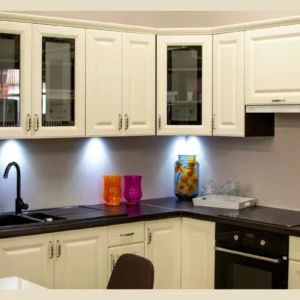 No-Drill Under-Cabinet Lighting Ideas for Rental Kitchens 1 renter friendly puck lights installed under corner kitchen cabinets with zero wall damage.