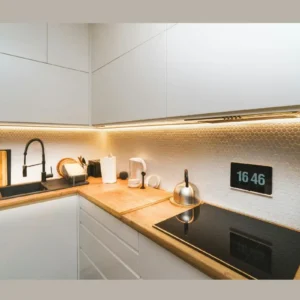 No-Drill Under-Cabinet Lighting Ideas for Rental Kitchens 4 renter friendly under cabinet LED strip lights installed in a bright corner kitchen layout.