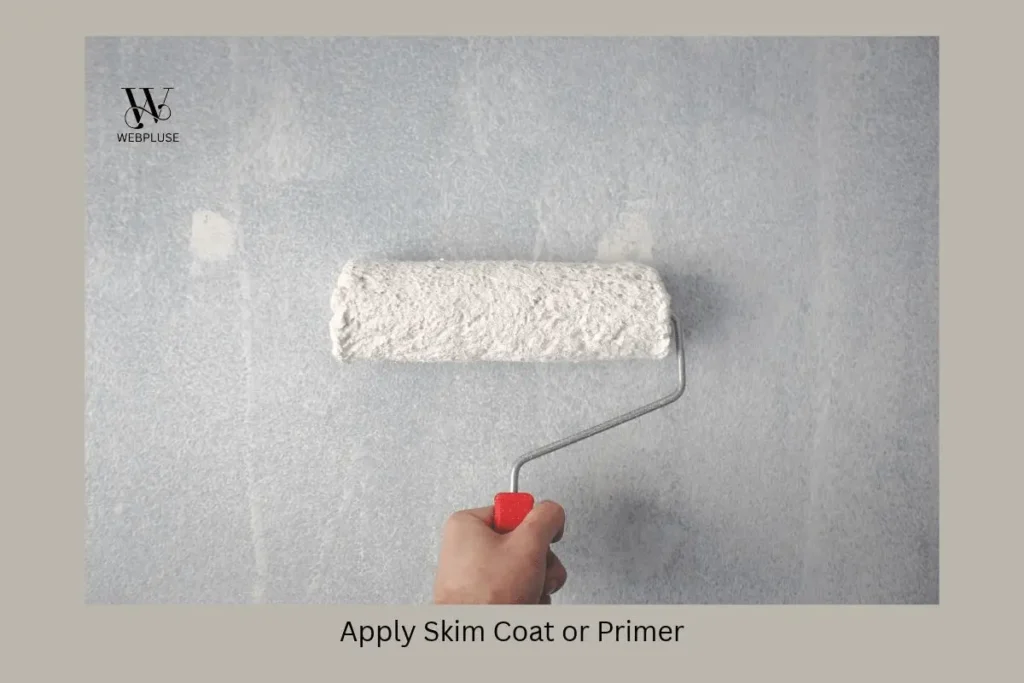How to Apply peel and stick backsplash on Textured Walls 3 Applying latex adhesion primer with roller on textured wall for peel and stick tiles.